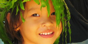 ASEAN UP CSR symbol: a cute girl with a crown of leaves
