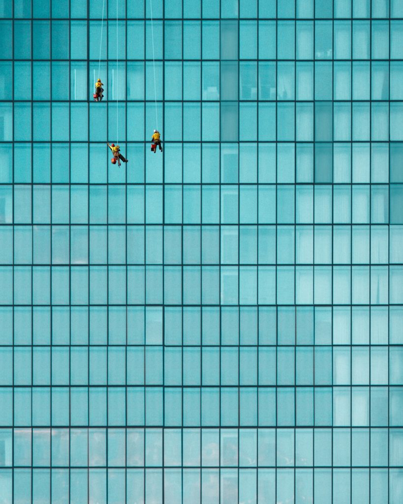 Singapore architecture glass wall with cleaners