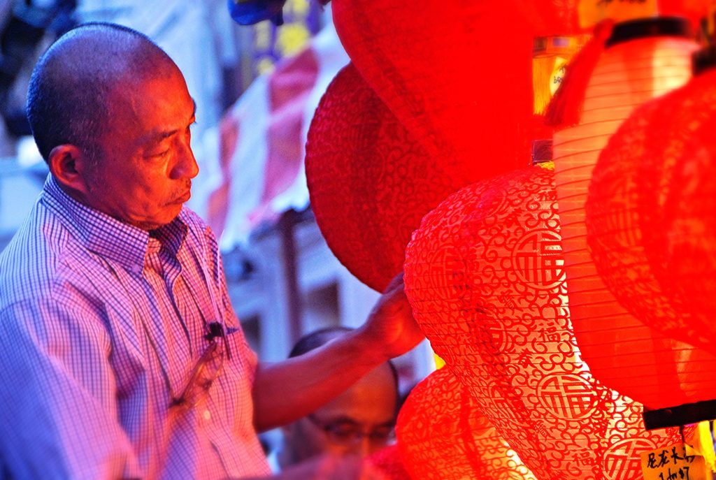 Singaporean man with lanterns