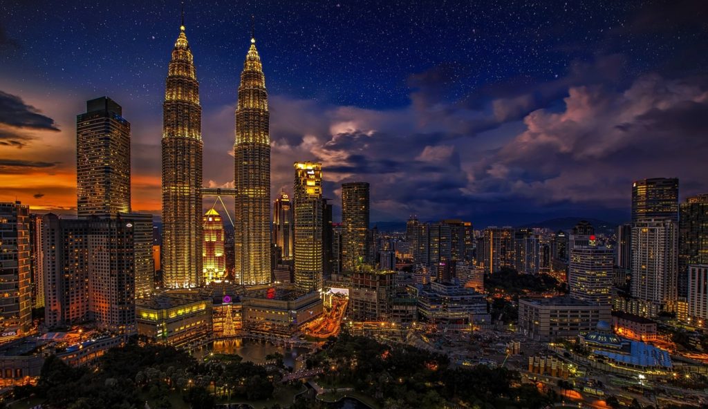 View of Kuala Lumpur with the Petronas towers at dusk