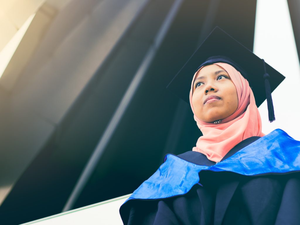 Malaysian Muslim girl with graduation outfit